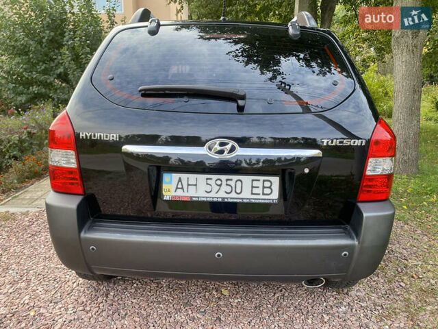 Чорний Хендай Туксон, об'ємом двигуна 2 л та пробігом 160 тис. км за 8800 $, фото 5 на Automoto.ua