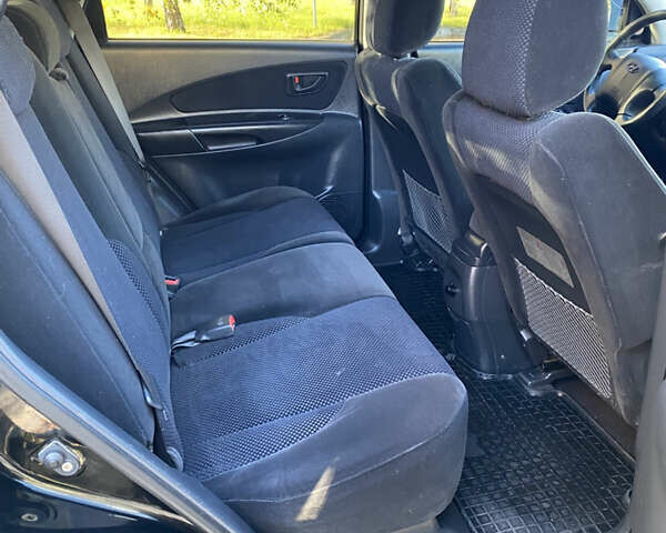 Черный Хендай Туксон, объемом двигателя 1.98 л и пробегом 218 тыс. км за 7200 $, фото 19 на Automoto.ua