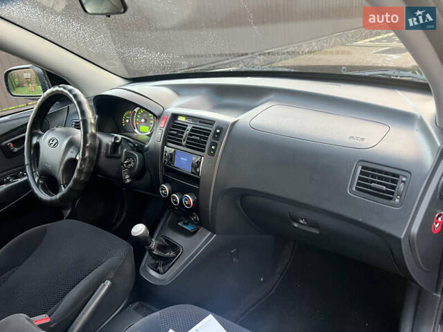 Черный Хендай Туксон, объемом двигателя 2 л и пробегом 276 тыс. км за 7450 $, фото 34 на Automoto.ua