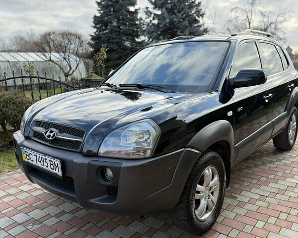 Чорний Хендай Туксон, об'ємом двигуна 2 л та пробігом 314 тис. км за 7000 $, фото 15 на Automoto.ua