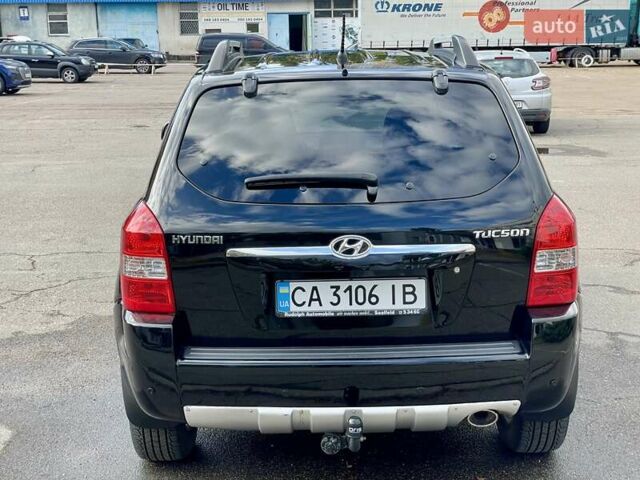 Черный Хендай Туксон, объемом двигателя 1.98 л и пробегом 172 тыс. км за 8500 $, фото 6 на Automoto.ua