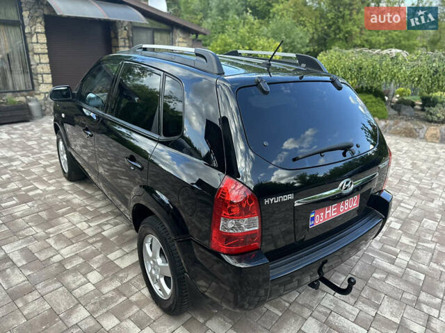 Черный Хендай Туксон, объемом двигателя 2 л и пробегом 218 тыс. км за 8700 $, фото 17 на Automoto.ua