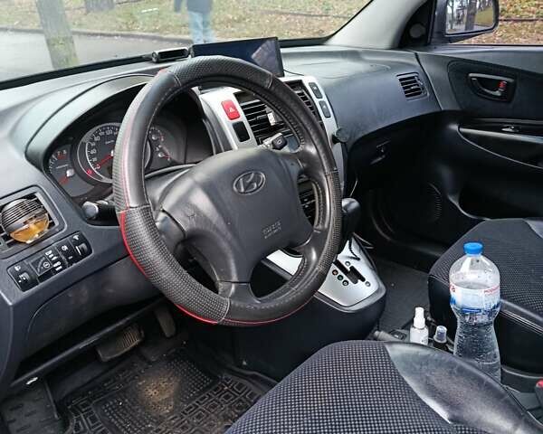 Чорний Хендай Туксон, об'ємом двигуна 1.98 л та пробігом 271 тис. км за 9200 $, фото 1 на Automoto.ua