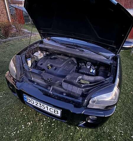 Черный Хендай Туксон, объемом двигателя 1.99 л и пробегом 203 тыс. км за 8000 $, фото 13 на Automoto.ua