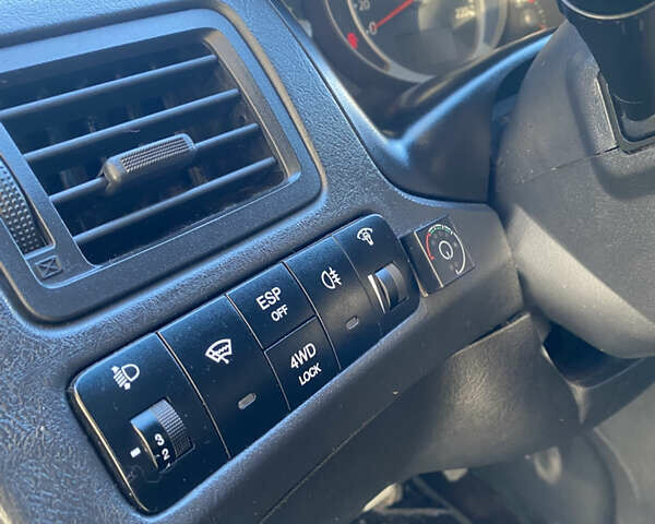 Черный Хендай Туксон, объемом двигателя 1.98 л и пробегом 218 тыс. км за 7200 $, фото 16 на Automoto.ua