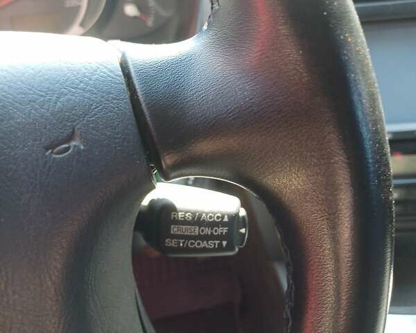 Черный Хендай Туксон, объемом двигателя 1.98 л и пробегом 189 тыс. км за 7800 $, фото 3 на Automoto.ua