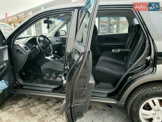 Чорний Хендай Туксон, об'ємом двигуна 2 л та пробігом 225 тис. км за 8000 $, фото 38 на Automoto.ua