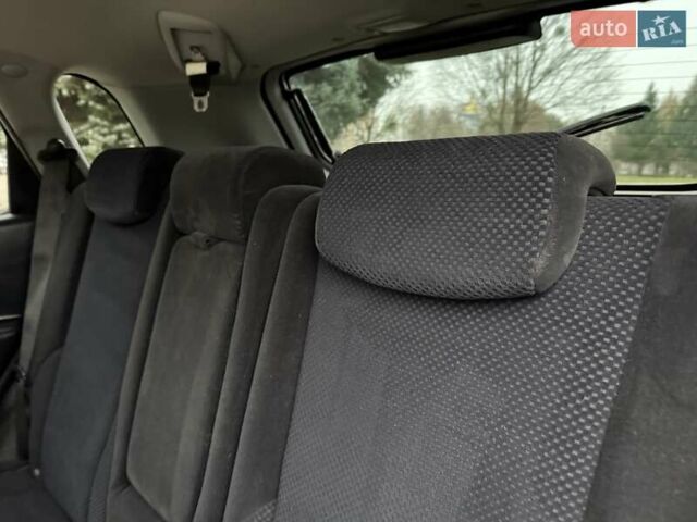 Черный Хендай Туксон, объемом двигателя 1.99 л и пробегом 240 тыс. км за 7200 $, фото 44 на Automoto.ua