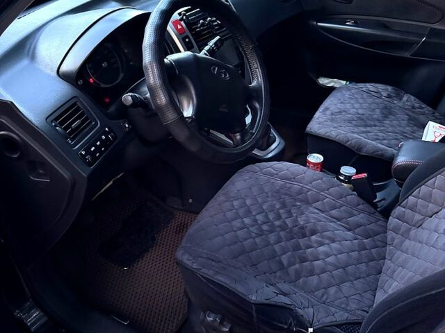 Чорний Хендай Туксон, об'ємом двигуна 2 л та пробігом 267 тис. км за 8200 $, фото 3 на Automoto.ua