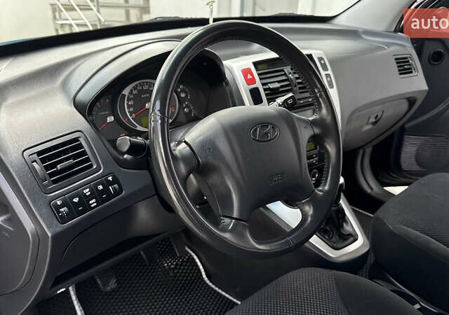 Черный Хендай Туксон, объемом двигателя 2 л и пробегом 67 тыс. км за 9999 $, фото 36 на Automoto.ua