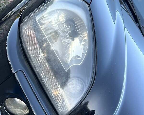 Черный Хендай Туксон, объемом двигателя 2 л и пробегом 230 тыс. км за 7500 $, фото 8 на Automoto.ua