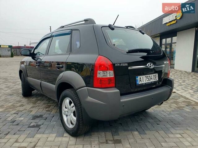 Чорний Хендай Туксон, об'ємом двигуна 2 л та пробігом 225 тис. км за 8000 $, фото 5 на Automoto.ua