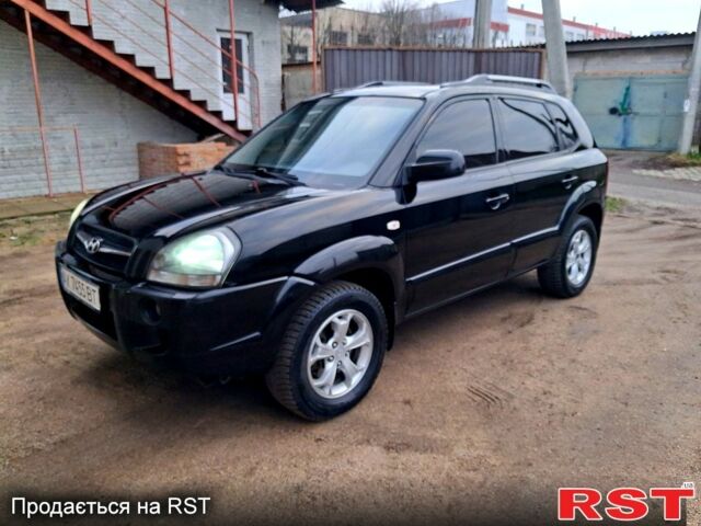 Чорний Хендай Туксон, об'ємом двигуна 2 л та пробігом 208 тис. км за 7500 $, фото 1 на Automoto.ua