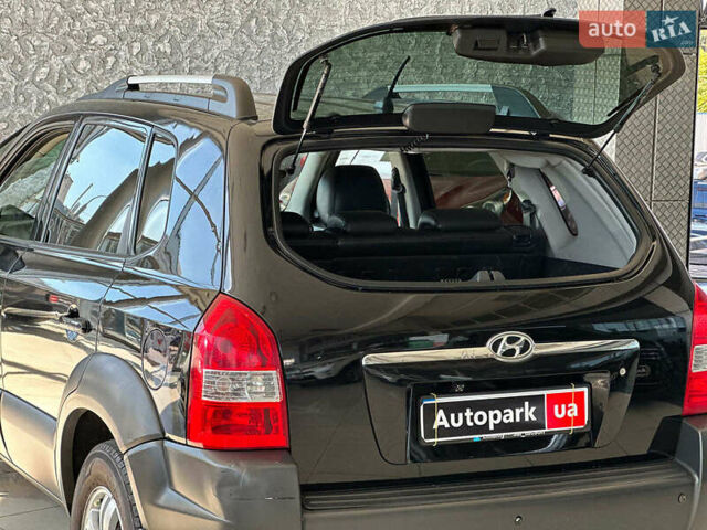 Черный Хендай Туксон, объемом двигателя 2.7 л и пробегом 158 тыс. км за 7940 $, фото 13 на Automoto.ua