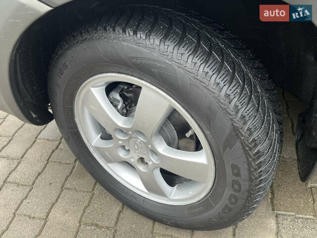 Черный Хендай Туксон, объемом двигателя 2 л и пробегом 107 тыс. км за 8900 $, фото 14 на Automoto.ua