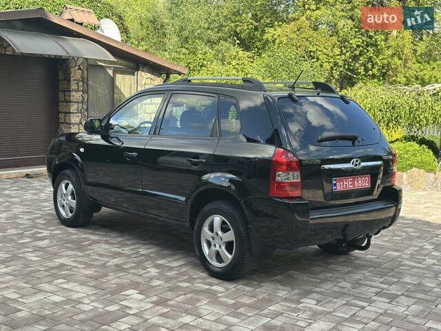 Черный Хендай Туксон, объемом двигателя 2 л и пробегом 218 тыс. км за 8700 $, фото 6 на Automoto.ua