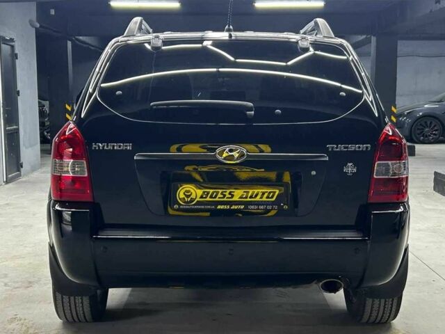 Черный Хендай Туксон, объемом двигателя 2 л и пробегом 224 тыс. км за 7800 $, фото 4 на Automoto.ua