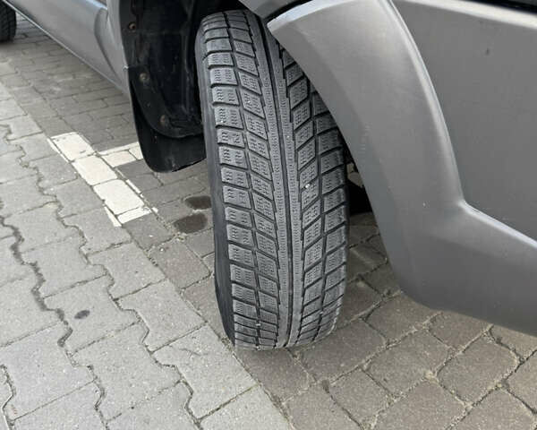 Чорний Хендай Туксон, об'ємом двигуна 1.98 л та пробігом 318 тис. км за 7399 $, фото 15 на Automoto.ua