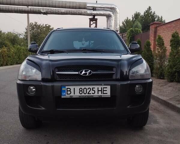 Черный Хендай Туксон, объемом двигателя 2 л и пробегом 221 тыс. км за 8600 $, фото 3 на Automoto.ua