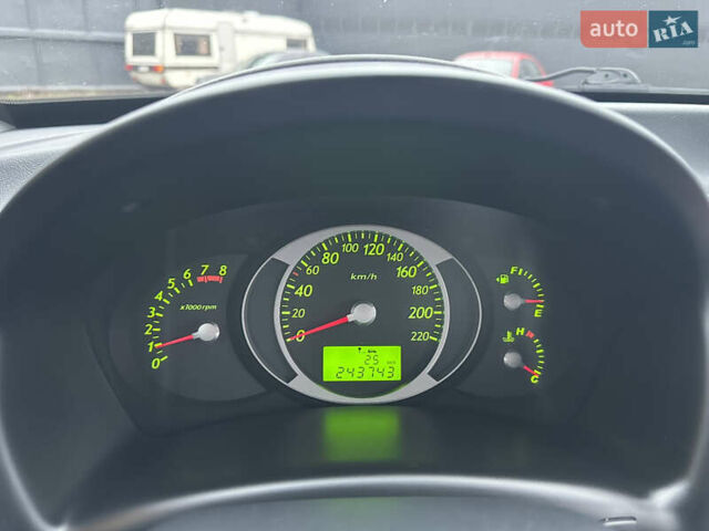 Чорний Хендай Туксон, об'ємом двигуна 2 л та пробігом 243 тис. км за 7999 $, фото 37 на Automoto.ua