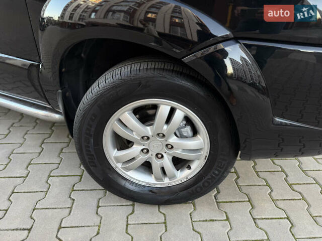 Чорний Хендай Туксон, об'ємом двигуна 2 л та пробігом 156 тис. км за 7850 $, фото 40 на Automoto.ua