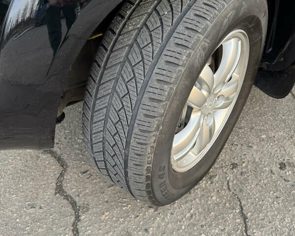 Черный Хендай Туксон, объемом двигателя 2 л и пробегом 210 тыс. км за 7850 $, фото 20 на Automoto.ua