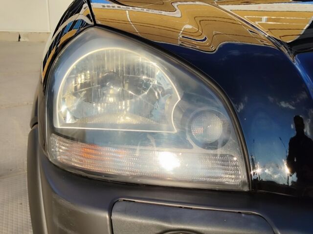 Черный Хендай Туксон, объемом двигателя 2 л и пробегом 82 тыс. км за 7490 $, фото 10 на Automoto.ua