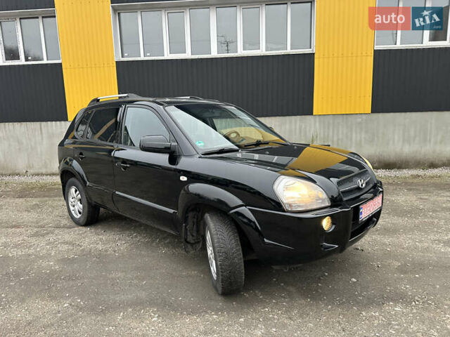 Чорний Хендай Туксон, об'ємом двигуна 2 л та пробігом 243 тис. км за 7999 $, фото 25 на Automoto.ua