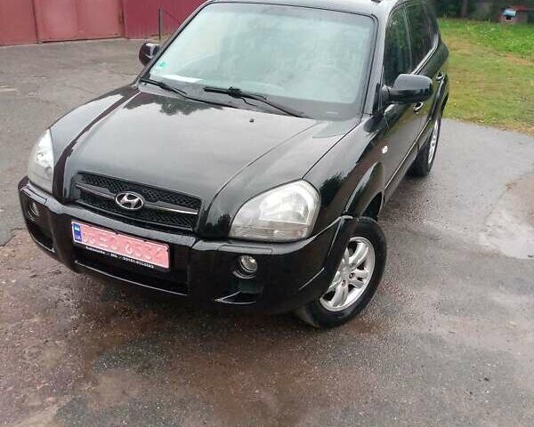 Чорний Хендай Туксон, об'ємом двигуна 2 л та пробігом 225 тис. км за 7850 $, фото 17 на Automoto.ua