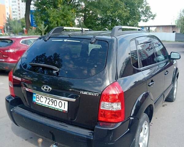 Черный Хендай Туксон, объемом двигателя 1.98 л и пробегом 195 тыс. км за 6981 $, фото 9 на Automoto.ua