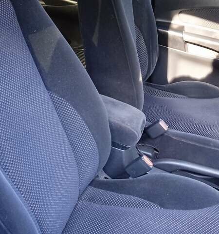 Черный Хендай Туксон, объемом двигателя 1.98 л и пробегом 200 тыс. км за 6600 $, фото 8 на Automoto.ua