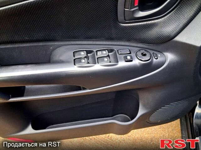 Чорний Хендай Туксон, об'ємом двигуна 2 л та пробігом 208 тис. км за 7500 $, фото 6 на Automoto.ua