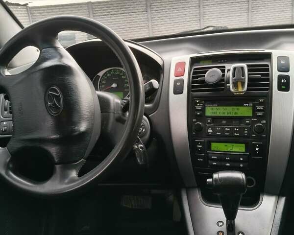 Чорний Хендай Туксон, об'ємом двигуна 2 л та пробігом 185 тис. км за 7499 $, фото 13 на Automoto.ua