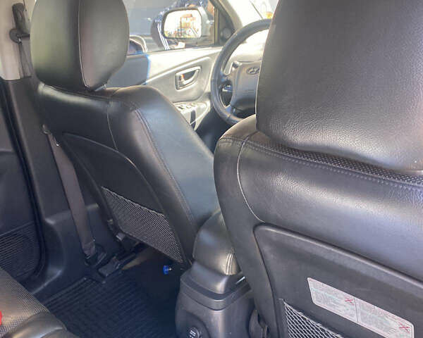 Чорний Хендай Туксон, об'ємом двигуна 1.99 л та пробігом 230 тис. км за 8000 $, фото 7 на Automoto.ua