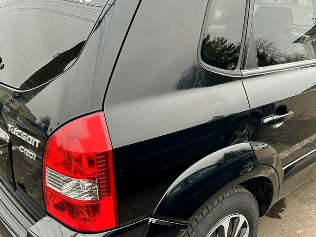 Чорний Хендай Туксон, об'ємом двигуна 2 л та пробігом 260 тис. км за 7700 $, фото 2 на Automoto.ua