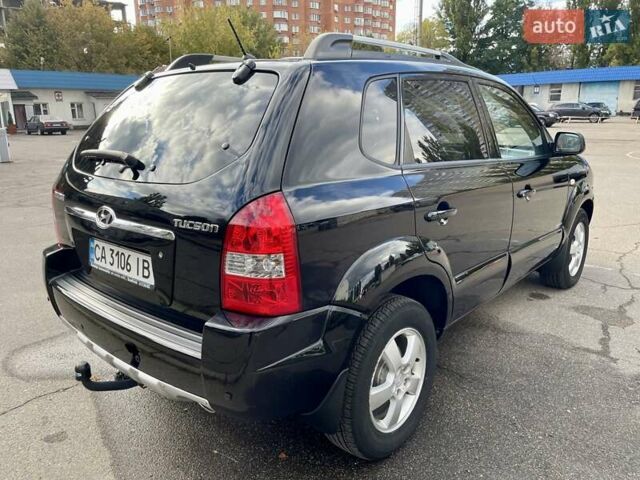 Черный Хендай Туксон, объемом двигателя 1.98 л и пробегом 172 тыс. км за 8500 $, фото 17 на Automoto.ua