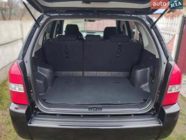 Черный Хендай Туксон, объемом двигателя 2 л и пробегом 237 тыс. км за 7500 $, фото 22 на Automoto.ua