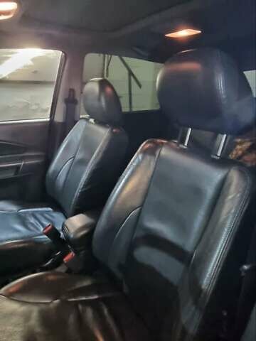 Черный Хендай Туксон, объемом двигателя 2.66 л и пробегом 311 тыс. км за 7200 $, фото 7 на Automoto.ua