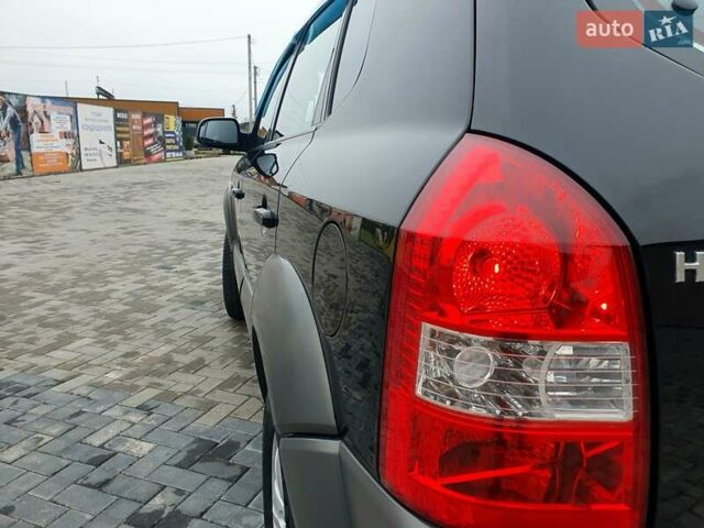 Чорний Хендай Туксон, об'ємом двигуна 2 л та пробігом 225 тис. км за 8000 $, фото 32 на Automoto.ua