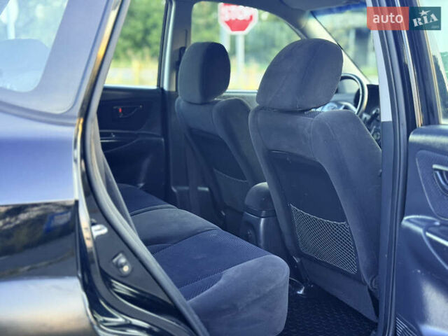 Черный Хендай Туксон, объемом двигателя 2 л и пробегом 250 тыс. км за 7600 $, фото 17 на Automoto.ua