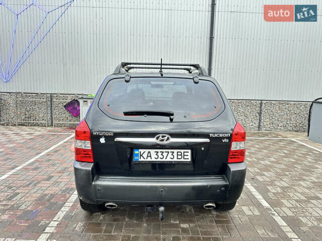 Чорний Хендай Туксон, об'ємом двигуна 2.66 л та пробігом 395 тис. км за 9950 $, фото 7 на Automoto.ua