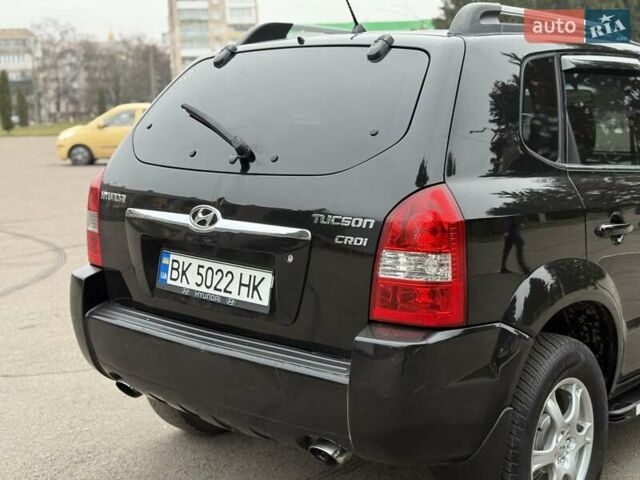 Черный Хендай Туксон, объемом двигателя 1.99 л и пробегом 240 тыс. км за 7200 $, фото 20 на Automoto.ua