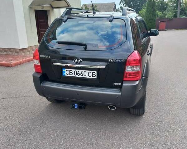 Черный Хендай Туксон, объемом двигателя 2 л и пробегом 168 тыс. км за 9000 $, фото 8 на Automoto.ua