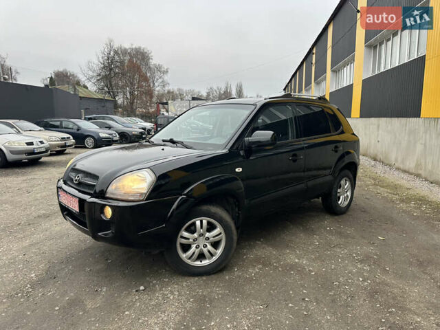 Чорний Хендай Туксон, об'ємом двигуна 2 л та пробігом 243 тис. км за 7999 $, фото 4 на Automoto.ua