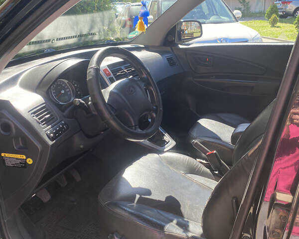 Чорний Хендай Туксон, об'ємом двигуна 1.99 л та пробігом 230 тис. км за 8000 $, фото 10 на Automoto.ua