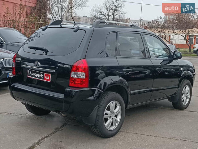 Черный Хендай Туксон, объемом двигателя 2 л и пробегом 192 тыс. км за 7990 $, фото 6 на Automoto.ua
