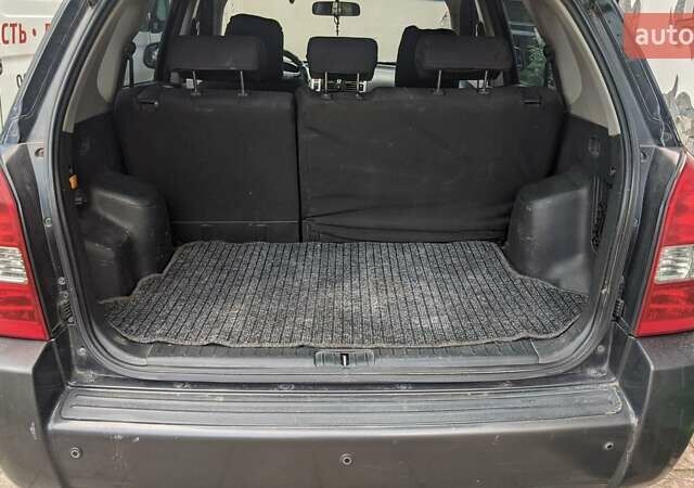 Черный Хендай Туксон, объемом двигателя 2 л и пробегом 163 тыс. км за 8100 $, фото 35 на Automoto.ua