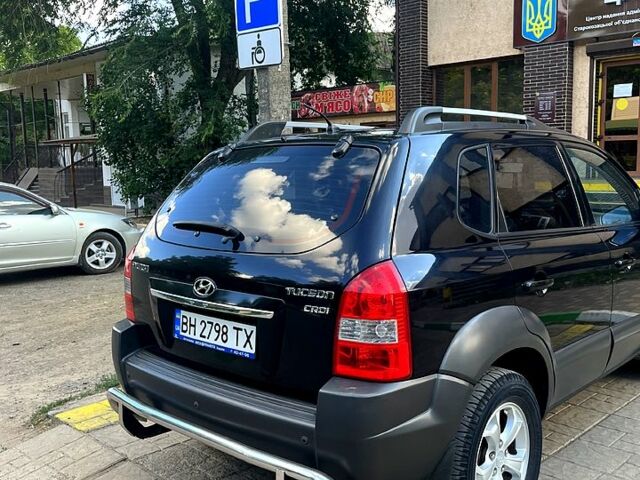 Черный Хендай Туксон, объемом двигателя 2 л и пробегом 151 тыс. км за 9000 $, фото 1 на Automoto.ua