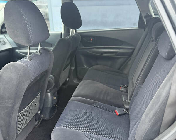 Чорний Хендай Туксон, об'ємом двигуна 2 л та пробігом 240 тис. км за 6888 $, фото 14 на Automoto.ua