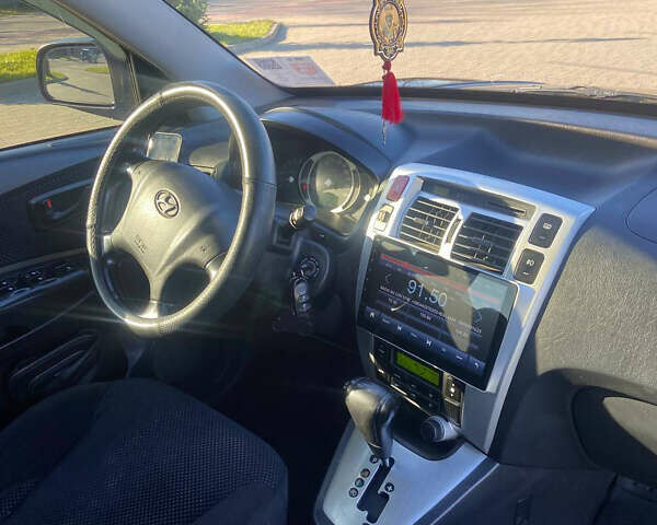 Чорний Хендай Туксон, об'ємом двигуна 1.99 л та пробігом 250 тис. км за 7800 $, фото 7 на Automoto.ua